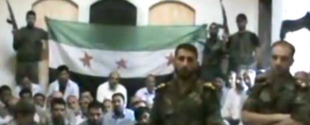 Syrian rebels with hostages, threatening to kill them Syrian rebels with hostages, threatening to kill them